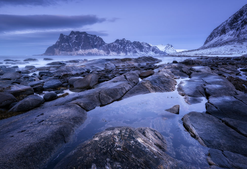 night landscape with rocks in foreground