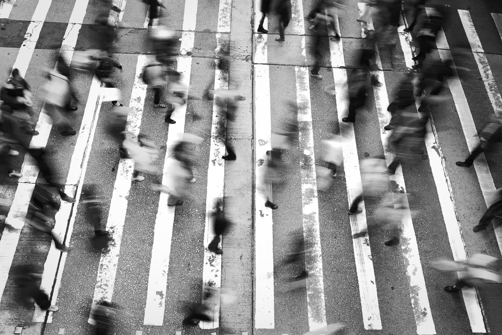 Long exposure urban photography of a city crosswalk BW