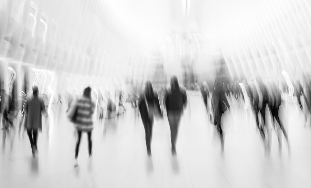 Motion blur of people in a building