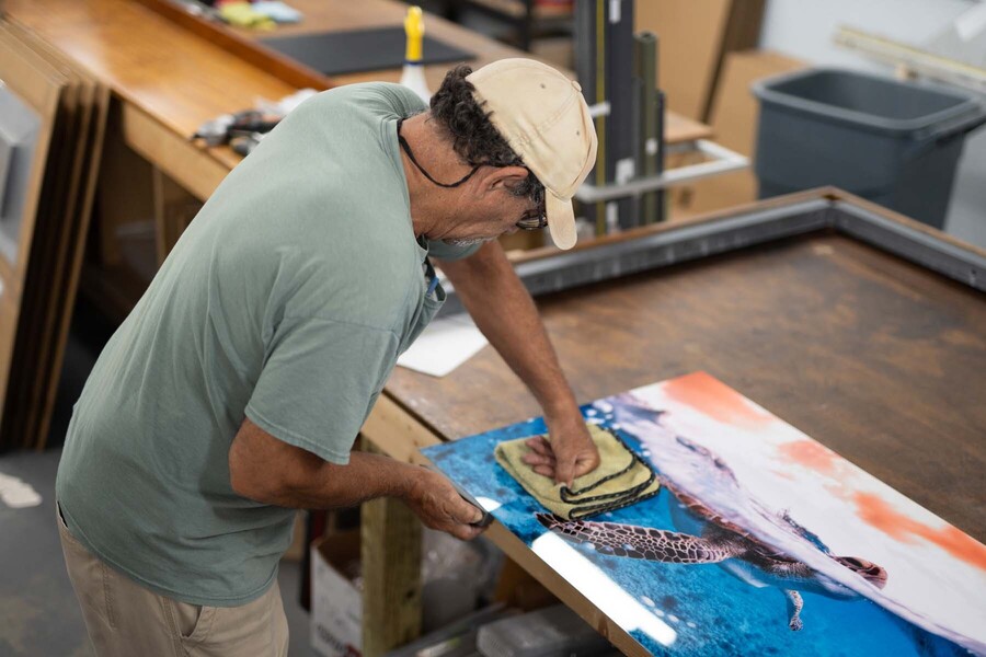 Shiny Prints Man working on a turtle print