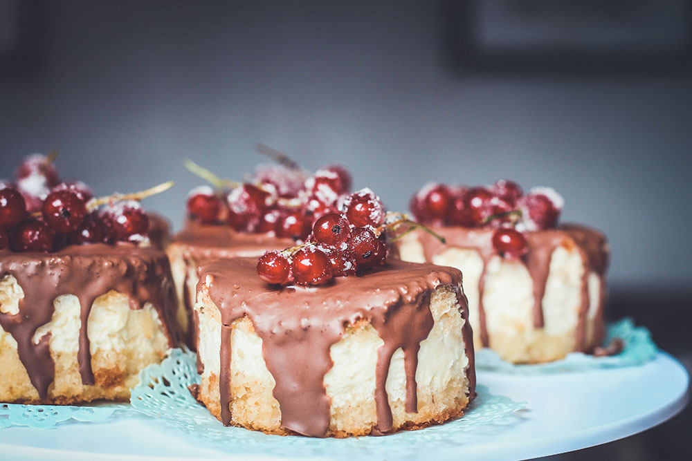 food photography lighting setup for cake with cherries on top