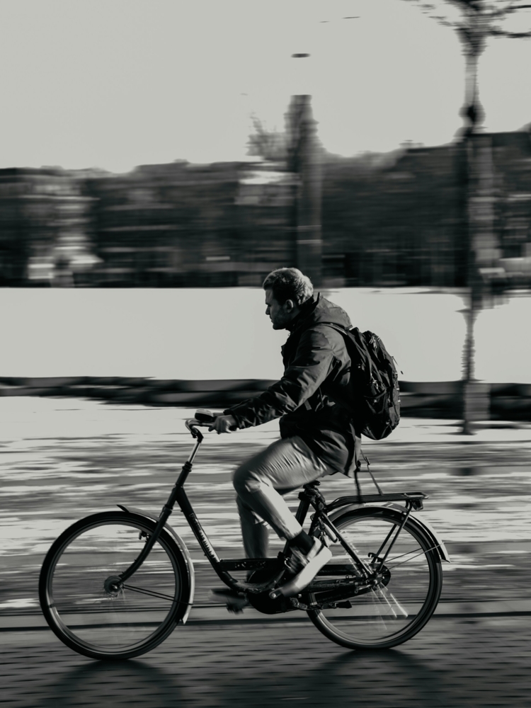 Man on a bike with motion blur